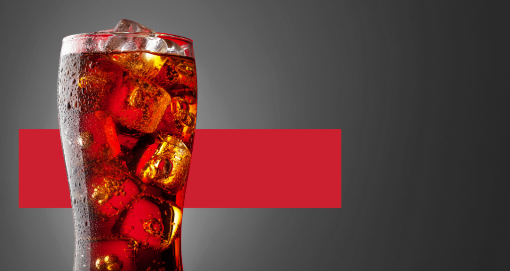 ice cold glass of cola in color with grayscale background